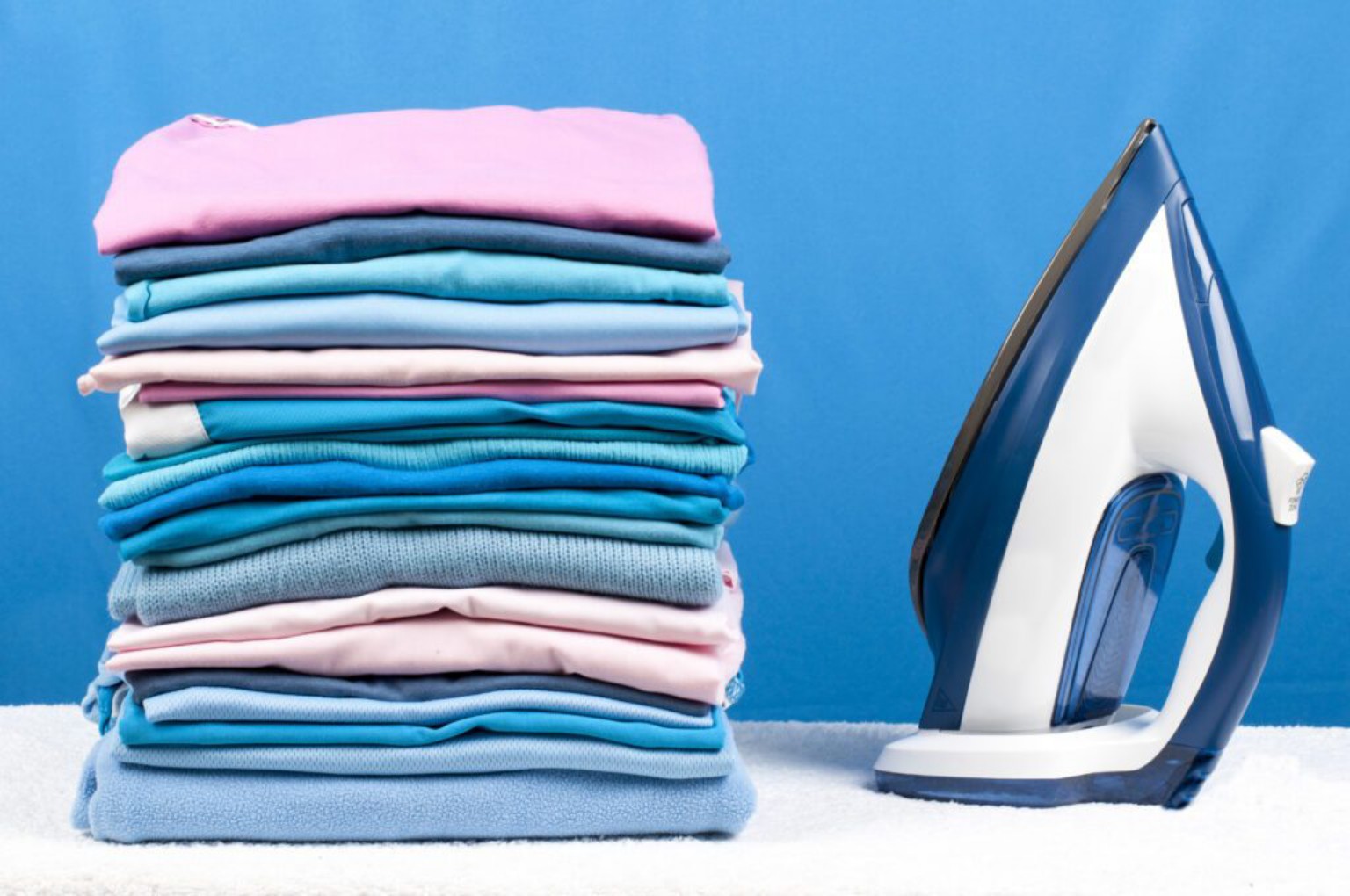 Folded clothes and iron